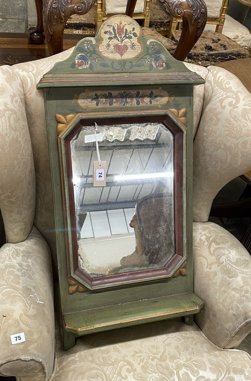 A Tyrolean style painted wall mirror with octagonal plate, width 41cm, height 88cm